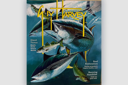 A Guy Harvey magazine cover for Spring 2022, featuring an illustrated image of swimming tuna.